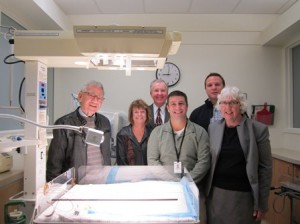 (l to r) Shrewsbury Rotarians Art Dobson, Julie Parent, Roy Balfour, Derek Grillo, and Debi Hemdal with Dr. Alan Picarillo (front) in the NICU at UMass Memorial Children's Medical Center. (Photo/submitted)