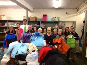 Worcester County Sheriff Lew Evangelidis with staff of St. Anne's Human Services of Shrewsbury, the Worcester County Sheriff's Office Community Outreach Team and volunteers, during the sheriff's visit to drop off and distribute winter coats as part of his annual Winter Coat Drive. (Photo/submitted)
