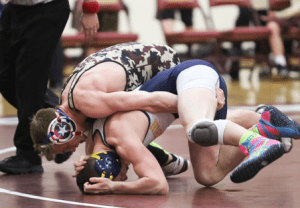 Austin Lee attempts to take down his opponent. 