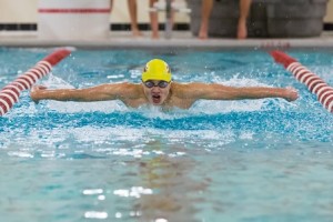 Algonquin's Kevin Shi swims the 100-yard butterfly at the Clark University Kneller Athletic Center Jan 6.