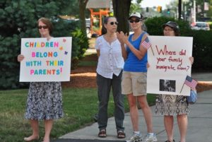 Local residents demand that ‘Families Belong Together’