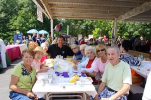 Worcester County Sheriff Lew Evangelidis stops by to say hello to seniors from Shrewsbury, Grafton and Worcester at the Sheriff's annual Senior Picnic Aug. 16.