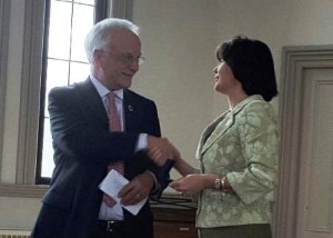 Chris Robbins presents State Rep. Carolyn Dykema with the Challenge Coin. Photo/submitted