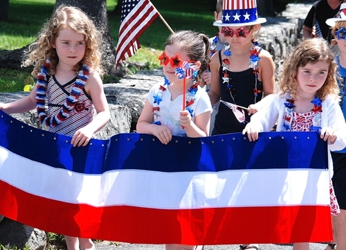 Kids march in a star-spangled Southborough parade