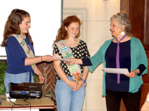 (l to r) Kathryn Gowdy and Shannon Provencal of Girl Scout Troop 85160 receive a special award from Debbie Costine, vice president of the Southborough Open Land Foundation. Photo/submitted