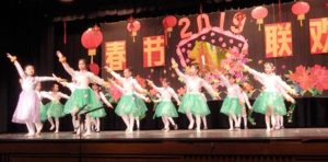 Families celebrate ‘The Year of the Pig’ with joyful performances