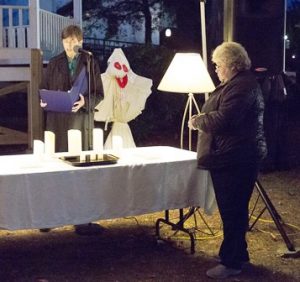 Vigil offers support for victims of domestic abuse