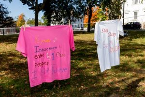 T-shirts with poignant messages are displayed. 
