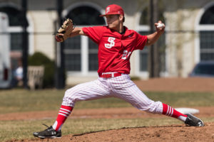 St. John’s starting pitcher Jared Wetherbee winds up to throw a pitch.