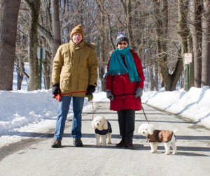 Clara and Dick of Berlin with "Sissy" and "Molly" enjoy a walk at Dean Park. 