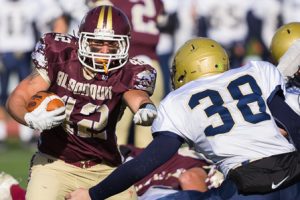 Algonquin’s Max Cerasoli looks to evade a tackle by Shrewsbury’s Nate Hautala.
