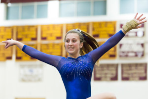 Julia Schaefer looks to be enjoying herself as she performs her floor routine.