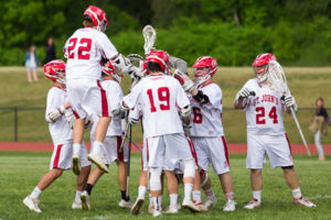St. John’s players celebrate their victory over Algonquin.