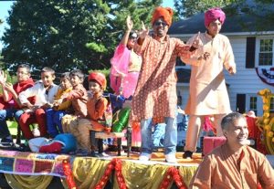 A wide age range is represented on the float of the Shrewsbury-based India Society of Worcester 