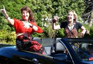 Gypsy Phillips and Anna Connors represent the Silver Moon Gypsies. The belly-dance troupe performed the previous day at the Town Expo.