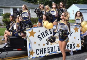 Shrewsbury High School cheerleaders display their spirit while riding the float that was named second place. Photos/Ed Karvoski Jr.