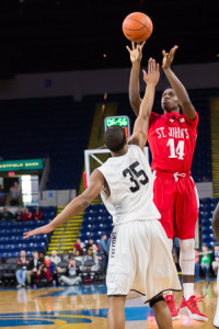Adham Floyd leaps as he shoots. 