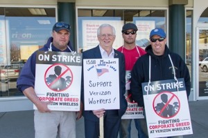 Doug Belanger, vice president/business agent for the UFCW, United Food and Commercial Workers Local 1445 joins the picket line at the Verizon wireless store in Shrewsbury. (left to right) Matt Rocha, Doug Belanger, Matt McGrail and Jim White. 