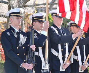 The Reserve Officer Training Corps color guard from the College of the Holy Cross in Worcester presents the colors as the national anthem is sung. 