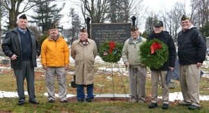 Gathered at the Veterans’ Lot at Mountain View Cemetery for a wreath-laying ceremony are (l to r) Commander William Rand of Ray Stone American Legion Post 238, Commander Fred Russell of Victor R. Quaranta American Legion Post 397, Commander James Dunlevy of Charles J. Murphy VFW Post 10278, and Ray Stone American Legion Post 238 members Past Commander Don Gray, Art Dobson and John Travers. Photos/Ed Karvoski Jr.