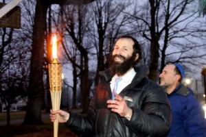 Rabbi Green prepares to light the Menorah. 