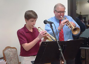Jonathan Tomashefsky, a freshman at Westborough High School, performs a duet with his father, Paul Tomashefsky, a music educator at Mill Pond School in Westborough.