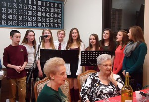 Students from Oak Middle School, Shrewsbury and Shrewsbury High School sing Christmas carols for the residents after their dinner. (Photos/submitted)