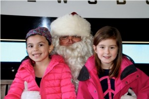Marianna, 7, and Kate, 7  with Santa