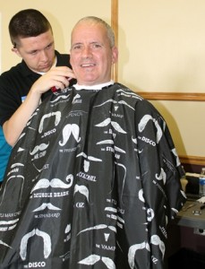 Matt Deschenes from New England School of Barbering cuts Michael Dodds