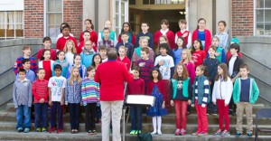 Kathy LeBoeuf directs the   Spring Street School fourth grade chorus. 