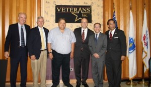 (left to right) Denis M. Leary, Pfc., Massachusetts State Guard, and vice president  and executive director of Veterans Inc.; Coleman Nee, state secretary of Veterans' Services; Harrif Morales, retired Army Sgt. and Veterans Inc. member; U.S. Rep. James  McGovern; Aaron Gornstein, state undersecretary for Housing and Community Development; and Vincent J. Perrone, retired  United States Air Force Lt. Col. and president and CEO of Veterans Inc. stand together during the July 15 announcement at Veterans Inc.  (Photo/Molly McCarthy) 
