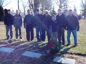 Members of Victor Quaranta American Legion Post 397, joined by Boy Scouts from the Ray Stone Post, pose for a photo after the wreath laying ceremony.  Photo/Bonnie Adams     