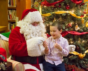 Liam Michalowski, 4,  is a "repeat customer" as he visits with Santa again. 