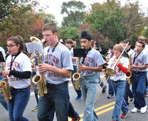 The Trottier Middle School Marching Band provides music for parade spectators.
