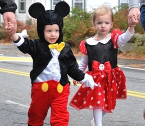 Jackson and Madison Rehlander, 22 months twins, are costumed as Mickey and Minnie Mouse.