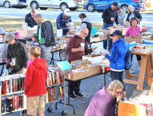 Shoppers of all ages browse the book sale offered by the Friends of the Southborough Library.