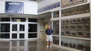 Athletic Director Jay Costa shows off the Shrewsbury High School Athletic Hall of Fame’s collection of trophies and awards won over the years. (Photo/Joyce DeWallace)