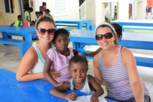 Katrina Foley (right) and her daughter, Meghan (left), with two of the children who live at the Be Like Brit Orphanage in Haiti. (Photos/submitted)