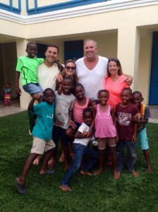 Katrina and Meghan Foley with Len and Richie Gengel and some of the children who live at the Be Like Brit Orphanage in Haiti.