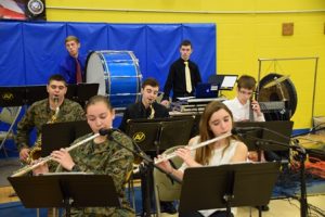 The Assabet band plays patriotic music as students, staff, and honored guests enter the gymnasium for the annual Veterans Day assembly.