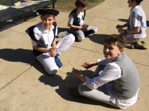 Millbury Street School students play traditional Colonial games.