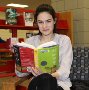 Jacquelyn Dillon with King’s book, “Please Ignore Vera Dietz”. Photos/submitted