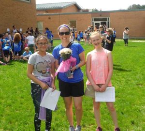 Patricia Rollins was honored by her students at a recent one mile run event she organized at the school. Photo/Bonnie Adams 