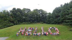 Neary Elementary School students pose to form the letters of the word “Hello” Photo/Melanie Petrucci 