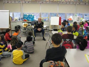 Staff Sergeant Daley speaks to first-graders at Floral Street Elementary School. (Photo/submitted)