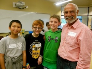 Sixth-graders Max Yan, Tanner Walling and Grag Hurter chat with Dr. David Bittar, a guest speaker during the reception. (Photo/Nance Ebert)