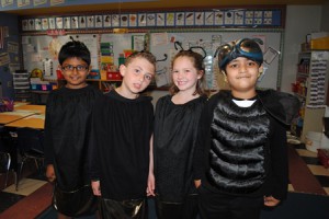 Fireflies Anish Biligere, Justin Goldberg, Isabelle Spencer and Kashyapa Gudipati, second-graders from Michelle Casciano's class get ready to perform “Goin' Buggy.” (Photo/Nance Ebert)