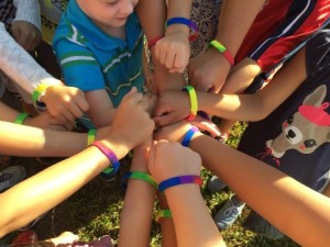 Farley students show off their friendship bracelets. (Photos/submitted)