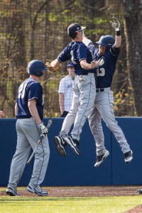 Shrewsbury’s Matthew Bonello (#13, right) celebrates with teammates after hitting a two-run home run in the fourth inning.
