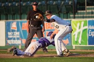 Shrewsbury’s Ryan Pumphret receives a pickoff throw as St. Peter-Marian’s PJ Barry dives back to first base.